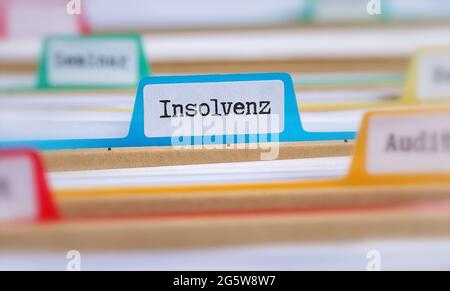 Ordner mit der Aufschrift Insolvenz auf deutsch - Insolvenz Stockfoto