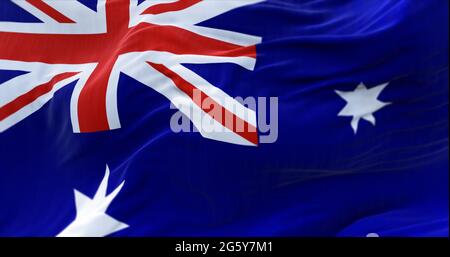 Detail der Nationalflagge Australiens, die im Wind fliegt. Demokratie und Politik. Australien ist eine konstitutionelle Monarchie des Bundestags Stockfoto