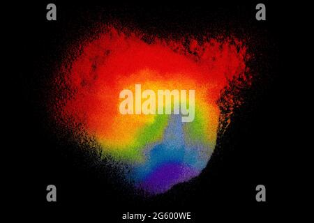 Farbiger Sand auf schwarzem Hintergrund Stockfoto