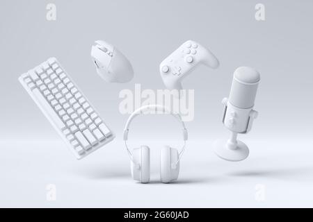 Fliegende Gamer-Gears wie Maus, Tastatur, Joystick, Headset, VR, Mikrofon Stockfoto