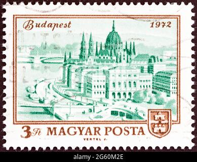 UNGARN - UM 1972: Eine in Ungarn gedruckte Briefmarke zum 100. Jahrestag der Vereinigung von Buda, Obuda und Pest als Budapest zeigt das Parlamentsgebäude. Stockfoto