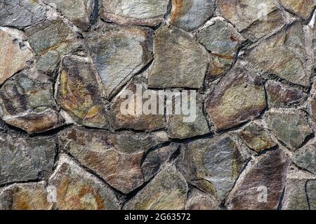 Vulkanische Steinplatten für natürliche Wände. Natürlicher Hintergrund. Stockfoto