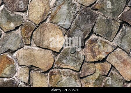 Vulkanische Steinplatten für natürliche Wände. Natürlicher Hintergrund. Stockfoto