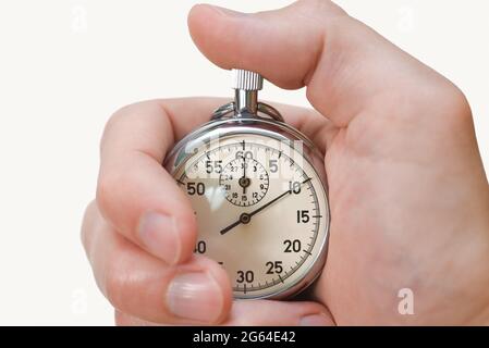 Stoppuhr-Taste drückt Handfinger auf weißen Hintergrund, isolieren. Stockfoto