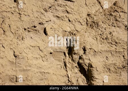 Die Textur des Sandes. Sandsteinbruch. Malerische Textur von Sandsteinen. Stockfoto