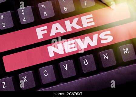 Schreiben mit Text gefälschte Nachrichten. Geschäftsansatz Falsche Informationen werden unter dem Deckmantel der Echtheit von Nachrichten veröffentlicht, die die Download-Verlaufsdateien erneut eingeben Stockfoto