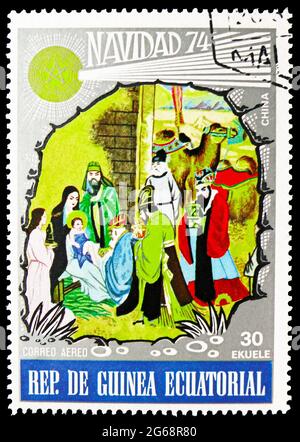 MOSKAU, RUSSLAND - 16. DEZEMBER 2020: Briefmarke gedruckt in Äquatorialguinea zeigt China, Weihnachtsserie, 30 Äquatorialguinea ekuele, um 1974 Stockfoto