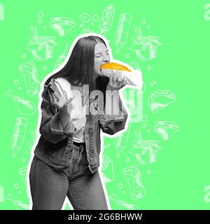 Junge Frau, die großes Sandwich isst, isoliert auf grünem Neon-Hintergrund. Zeitgenössische Kunstcollage und modernes Design. Konzept der Idee, Inspiration Stockfoto