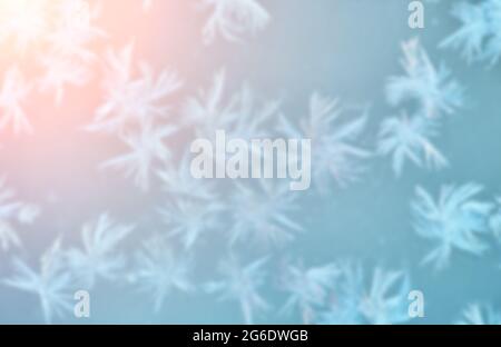 Makroaufnahme von Schneeflocken auf blauem Hintergrund Stockfoto