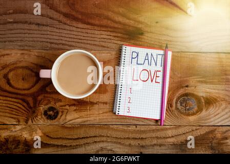 Konzeptionelle Bildunterschrift Plant Love. Wort geschrieben auf einem Symbol der emotionalen Liebe, Fürsorge und Unterstützung zeigte anderen Display von verschiedenen Farben Sticker Notes Stockfoto