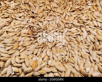 Nahaufnahme von Kürbiskernen. Detail Kürbiskerne Hintergrund. Stockfoto