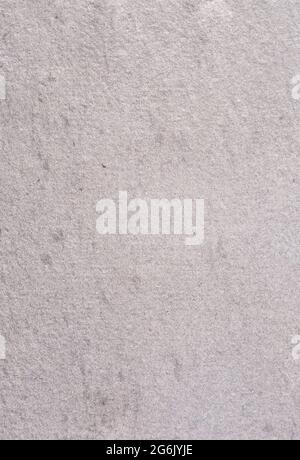Ein Hintergrund aus grauem, strukturiertem, handgefertigtem Papier Stockfoto