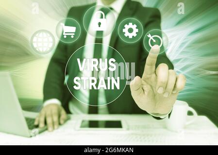 Handschrift Text Virus Strain. Internet-Konzept eine weitere genetische Variante aus dem ursprünglichen Mikroorganismus abgeleitet Bussiness man Sitting Desk Laptop und Stockfoto