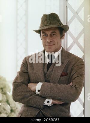 REX HARRISON Colour Portrait als Professor Henry Higgins in MY FAIR LADY 1964 Regisseur GEORGE CUKOR aus dem Broadway-Musical nach dem Stück Pygmalion von George Bernard Shaw Drehbuch und Lyrics Alan Jay Lerner Musik Frederick Loewe Produktionsdesign und Kostüme Cecil Beaton Produzent Jack L.Warner Bros Stockfoto