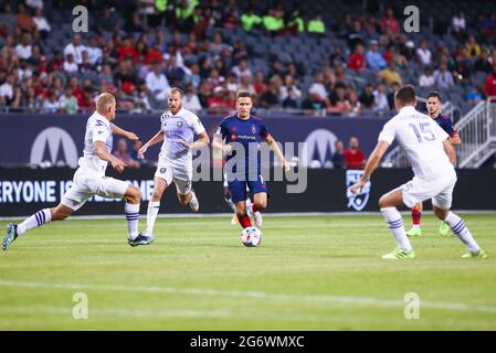 Chicago Fire Mittelfeldspieler Przemyslaw Frankowski (11) dribbelt den Ball während eines MLS-Spiels gegen den Orlando City SC im Soldier Field, Mittwoch, Juli Stockfoto