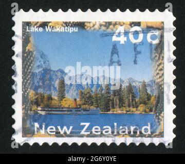 NEUSEELAND - UM 2000: Stempel gedruckt von Neuseeland, zeigt Lake Wakatipu, um 2000 Stockfoto