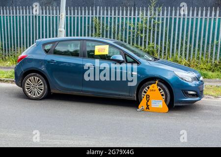 DVLA-Radklemme an einem nicht besteuerten Fahrzeug, Großbritannien Stockfoto