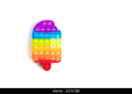 Rainbow Pop es Anti-Stress-Spielzeug isoliert auf weißem Hintergrund. Stockfoto