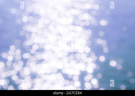 Bokeh Sonne glitzert vom Wasser Stockfoto