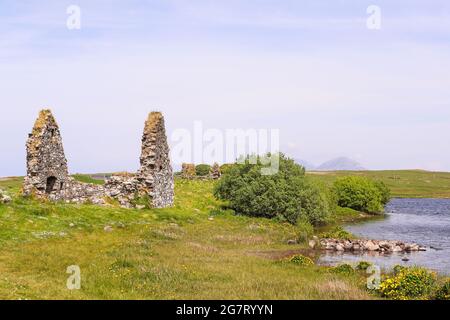 Finlaggan, ein ehemaliger königlicher Sitz der Macht, auf der Isle of Islay vor der Westküste Schottlands. Die kleine Insel ist berühmt für Whiskybrennereien. Stockfoto