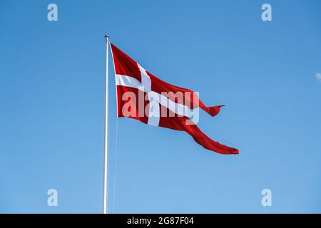 Dänemark National Flag auch als Dannebrog - Kopenhagen, Dänemark Stockfoto