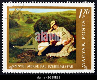 UNGARN - UM 1967: Eine in Ungarn gedruckte Briefmarke zeigt die Liebenden, Gemälde von Pal Szinyei Merse, ungarischer Maler, um 1967 Stockfoto