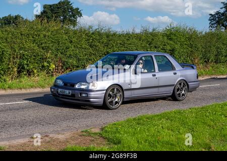 1992 90s Blue Ford SAP COS 4x4 1993 ccm 5-Gang-Handfahrzeug auf dem Weg zur Capesthorne Hall classic July Car Show, Cheshire, Großbritannien Stockfoto