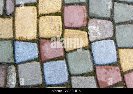 Mehrfarbige Betonpflasterung Platte. Schönes Muster, Hintergrund Nahaufnahme Stockfoto
