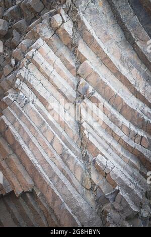 Graue vulkanische Basaltsäulen Texturen Stockfoto
