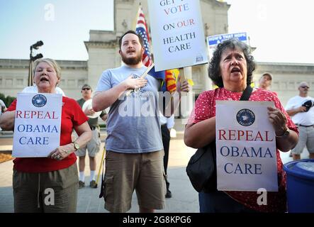 Aktivisten der Tea Party demonstrieren gegen den Affordable Care Act (Obamacare). Stockfoto