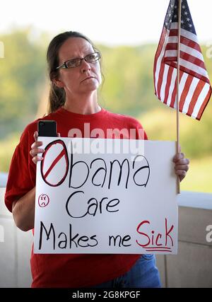 Aktivisten der Tea Party demonstrieren gegen den Affordable Care Act (Obamacare). Stockfoto