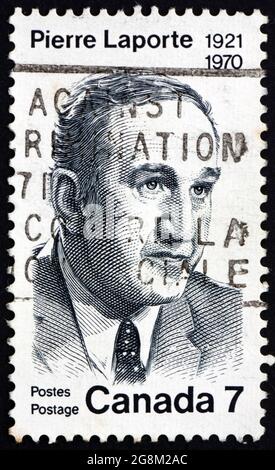 KANADA - UM 1971: Eine in Kanada gedruckte Briefmarke zeigt Pierre Laporte (1921-1970), Arbeitsminister, entführt und getötet, um 1971 Stockfoto