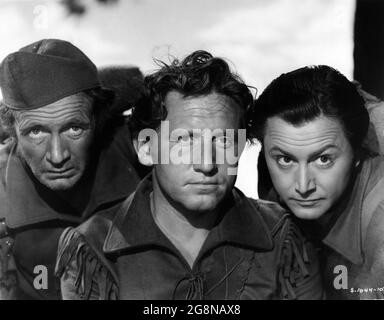 WALTER BRENNAN als Hunk Marriner SPENCER TRACY als Major Robert Rogers und ROBERT YOUNG als Langdon Towne Portrait von CLARENCE SINCLAIR BULLE in NORTHWEST PASSAGE (Book One - Rogers' Rangers) 1940 REGIEKÖNIG VIDOR Roman Kenneth Roberts Metro Goldwyn Mayer Stockfoto