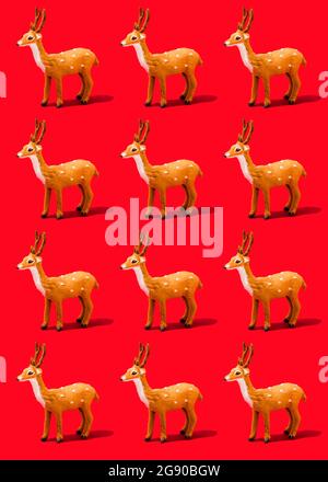 Muster von Rentierfiguren, die auf einem leuchtend roten Hintergrund stehen Stockfoto