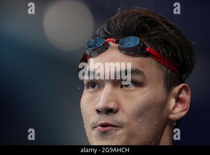 (210725) -- TOKIO, 25. Juli 2021 (Xinhua) -- Xu Jiayu aus China reagiert nach der 100-m-Rückenhitze der Männer beim Schwimmen bei den Olympischen Spielen 2020 in Tokio, Japan, am 25. Juli 2021. (Xinhua/Ding Xu) Stockfoto