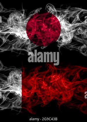 Rauchflaggen von Japan, Japan und den Vereinigten Arabischen Emiraten, Emiraten, Dubai, Ajman Stockfoto