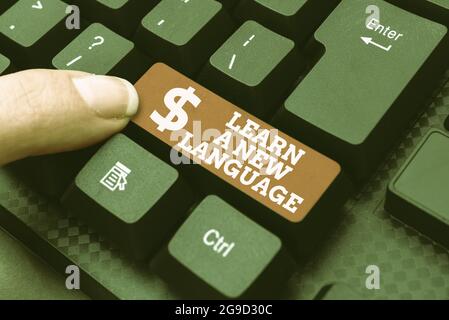 Text, der Inspiration zeigt Lernen SIE EINE neue Sprache. Wort geschrieben über die Fähigkeit, in der zweiten oder Fremdsprache zu kommunizieren Download von Online-Dateien und Stockfoto