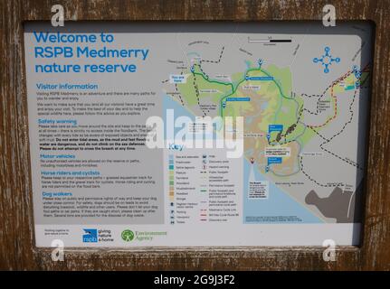 Karte und Text auf einem Brett über RSPB Medmerry Naturschutzgebiet. Stockfoto