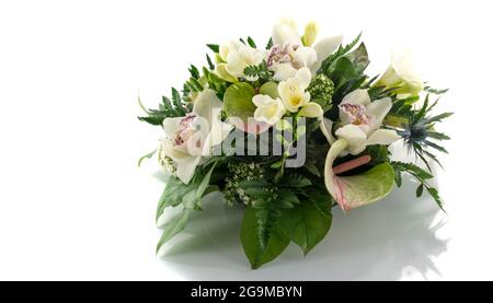 Gesteck mit Lilien Freesie und arum Stockfoto