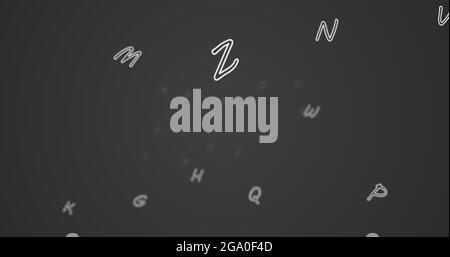 Zufällige Buchstaben im Alphabet, die in einem riesigen leeren Raum vorwärts schweben Stockfoto