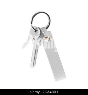 Schlüssel mit Lederschlüsselbund auf weißem Hintergrund Stockfoto