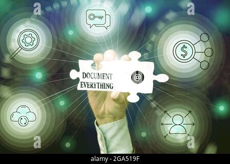 Schreiben Anzeige Text alles dokumentieren. Business Approach Computer-Datei, die Text, den Sie geschrieben haben Hand Holding Jigsaw Puzzle Stück enthält Stockfoto