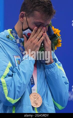 Tokio, Japan. Juli 2021. Mykhailo Romantschuk aus der Ukraine reagiert während der Preisverleihung nach dem 800 m langen Freistil-Finale der Männer beim Schwimmen bei den Olympischen Spielen 2020 in Tokio, Japan, am 29. Juli 2021. Quelle: Xu Chang/Xinhua/Alamy Live News Stockfoto