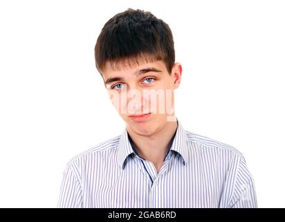 Junger Mann mit skeptischem Blick isoliert auf dem weißen Hintergrund Stockfoto