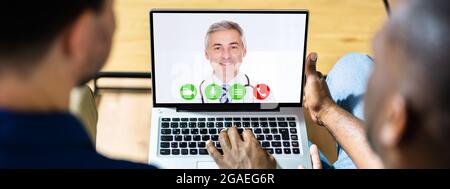 Arzt Video-Telefonkonferenz Am Computer Stockfoto