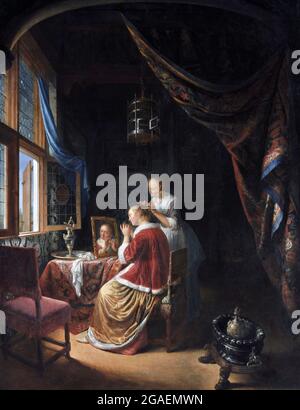 Eine junge Frau auf ihrer Toilette von Gerrit Dou (1613-1675), Öl auf Tafel, 1667 Stockfoto