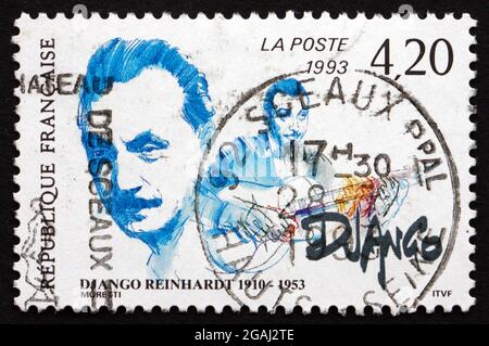 FRANKREICH - UM 1993: Eine in Frankreich gedruckte Briefmarke zeigt Jean Django Reinhardt, Musiker, Pioneering Virtuoso Jazz Gitarrist und Komponist, um 1993 Stockfoto