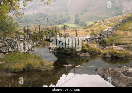 Slater Brücke über den Fluss Brathay in Little Langdale, im englischen Lake District Stockfoto