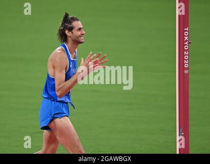 (210801) -- TOKIO, 1. August 2021 (Xinhua) -- Gianmarco Tamberi aus Italien reagiert während des Hochsprungfinales der Männer bei den Olympischen Spielen 2020 in Tokio, Japan, am 1. August 2021. (Xinhua/Jia Yuchen) Stockfoto