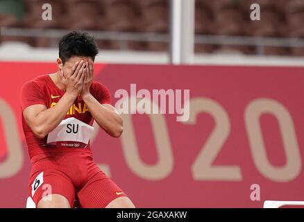 (210801) -- TOKIO, 1. August 2021 (Xinhua) -- Su Bingtian aus China reagiert während des 100-m-Finale der Männer bei den Olympischen Spielen 2020 in Tokio, Japan, am 1. August 2021. (Xinhua/Ju Huanzong) Stockfoto
